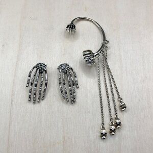 Silver tone skeleton hands earrings dangle skull cuff earring.